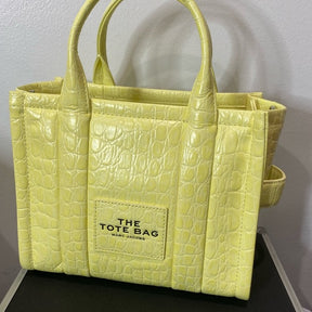 Marc Jacobs Croc Embossed Small Tote in Tender Yellow | Signature Logo Patch and Adjustable Strap