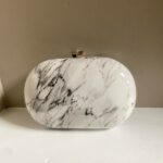 Olga Berg Maeve Marbled Acrylic Oval Clutch