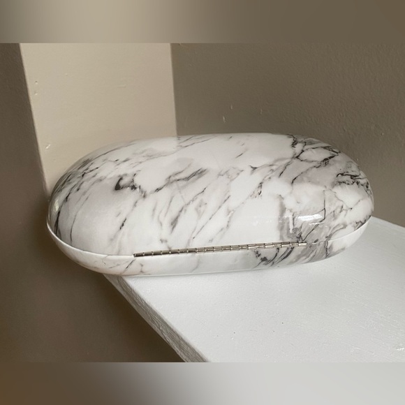 m_668fed640e5172515d9181da Olga Berg Maeve Marbled Acrylic Oval Clutch