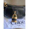 m_wp_697ea28b5df8e7623fea1ed6 Chloé The 99 Leather Shoulder Bag - Black with Gold Padlock