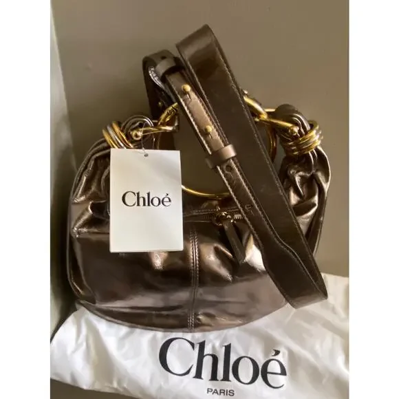 m_wp_697efee02fa0544e91a847b9 Chloé Small Bracelet Hobo Bag - Metallized Leather with Gold Ring