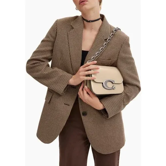 m_wp_6982f1c205deb3ed5ae0e8ec COACH Idol Bag in Ivory Leather - Oversized Silver "C" Logo Bag