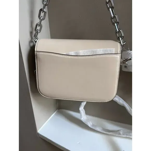 m_wp_6982f1c5d8024c06e65b7a67 COACH Idol Bag in Ivory Leather - Oversized Silver "C" Logo Bag