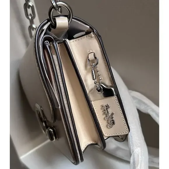 m_wp_6982f1c6c71ba1083fd90e76 COACH Idol Bag in Ivory Leather - Oversized Silver "C" Logo Bag