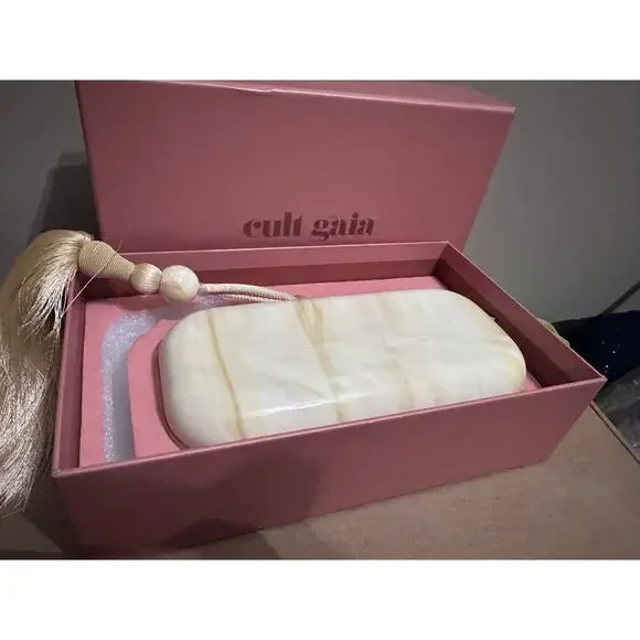 Cult Gaia Yasmin Acrylic Tassel Clutch - Sand Beige Marble